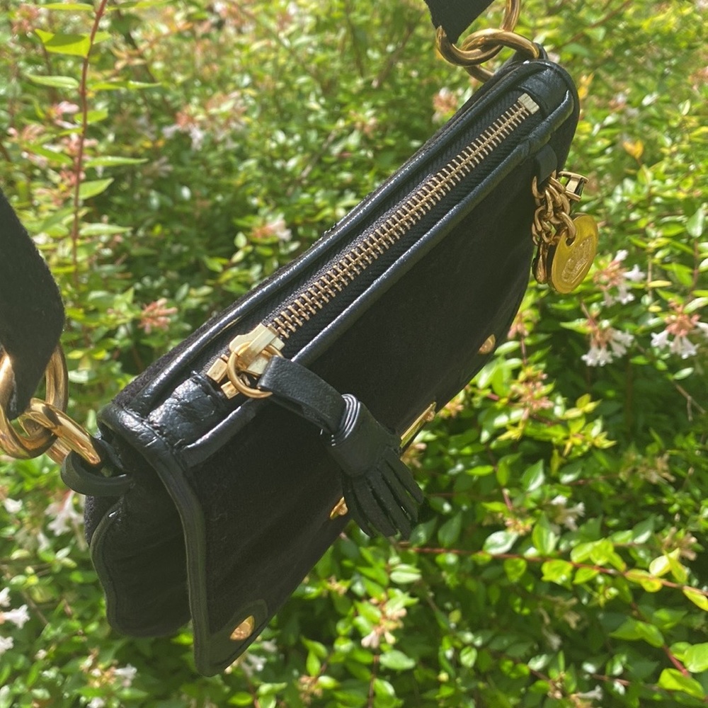 Juicy Couture Black satchel!!!!!!! Poka-Dot Interior soft material
ITEM #1 - Picture 3 of 16
